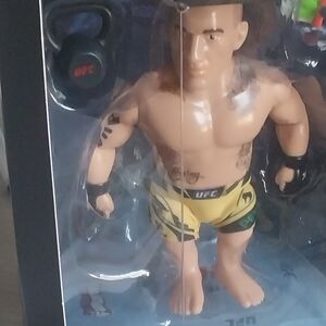 UFC Collectible Figure in Yellow and Black Gear